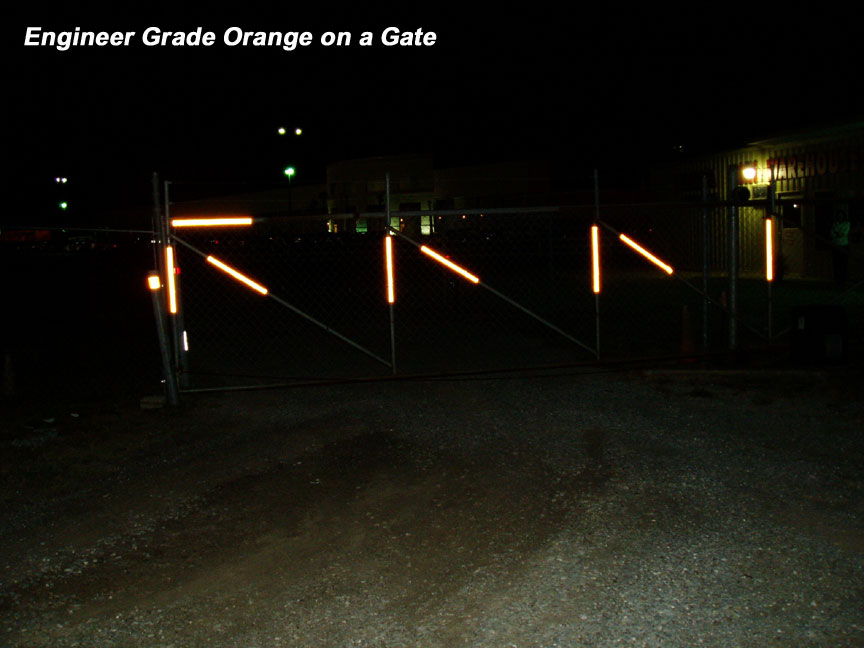orange reflective tape on a gate